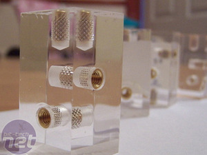 Phinix Cube used acrylic cubes, with screw holes that were lined with brass inserts.