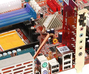 The heatpipe of Silent OTES eliminates the need for a noisy fan; AudioMAX 7.1 riser card in the foreground