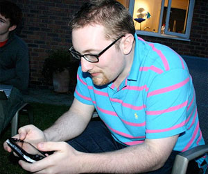 Wil enjoys some PSP in his trademark polo shirt.