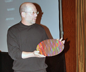Intel technical guru, Mooly Eden, shows off a Penryn wafer
