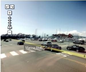 While no individual is seen clearly in this image, you can zoom in and clearly see the drivers of the vehicles.