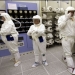Intel posts record revenue, lays off thousands